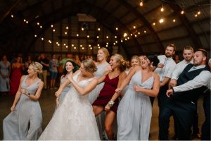 Bridal party dancing during reception