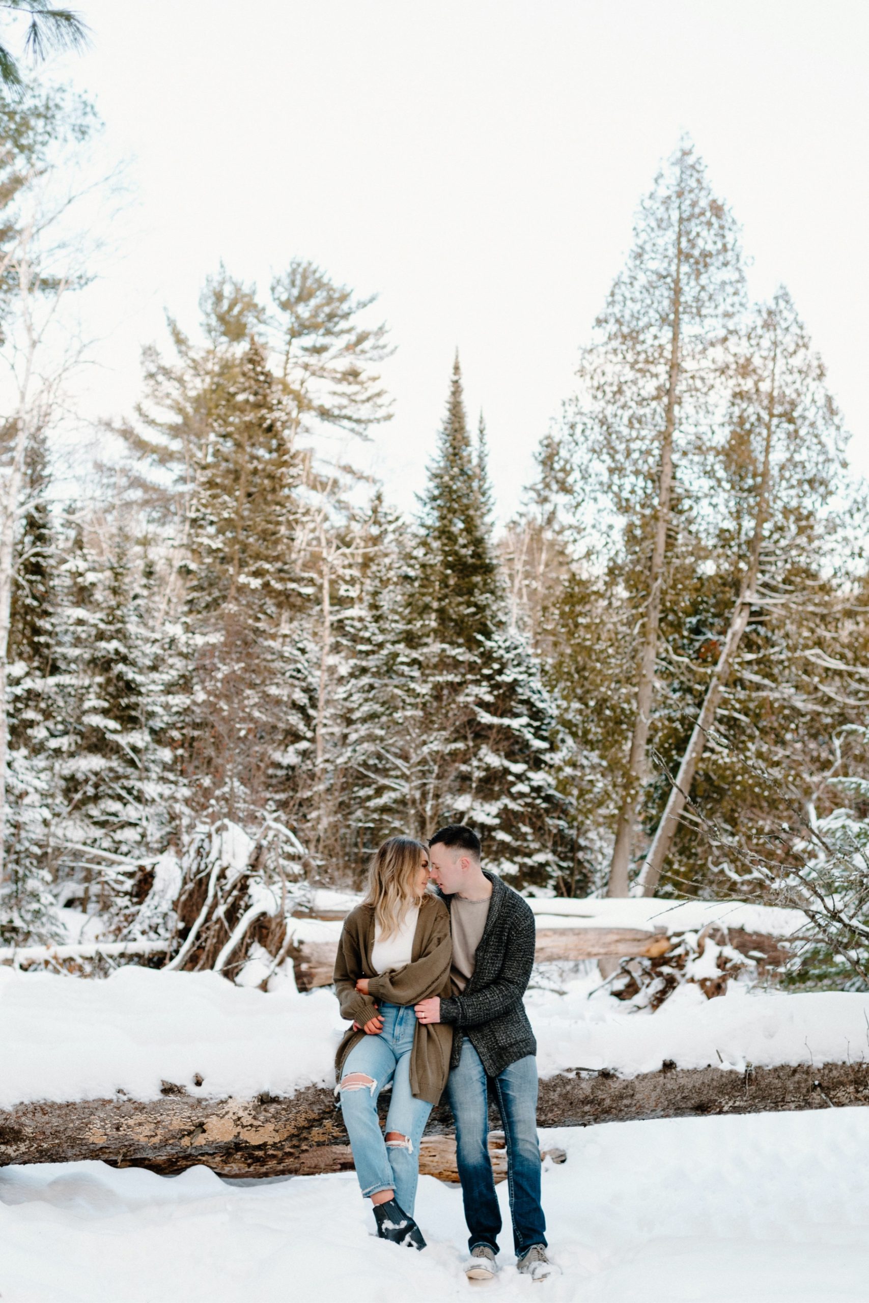 Couple hugging in the snow